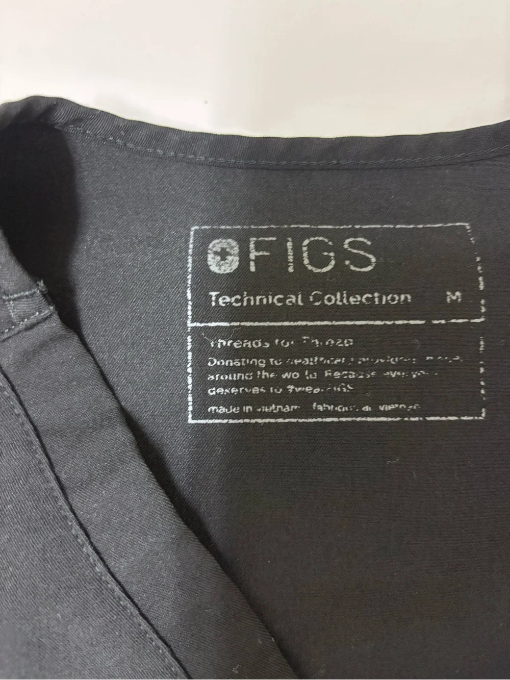 FIGS women’s Catarina Black Scrub Top - V-Neck Pocket